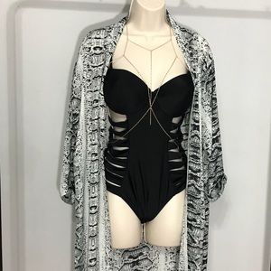 Victoria’s Secret strappy Black one-piece swimsuit